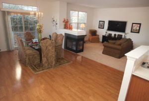Furnished dining room with wooden floors and carpet living room in Bucks County apartment